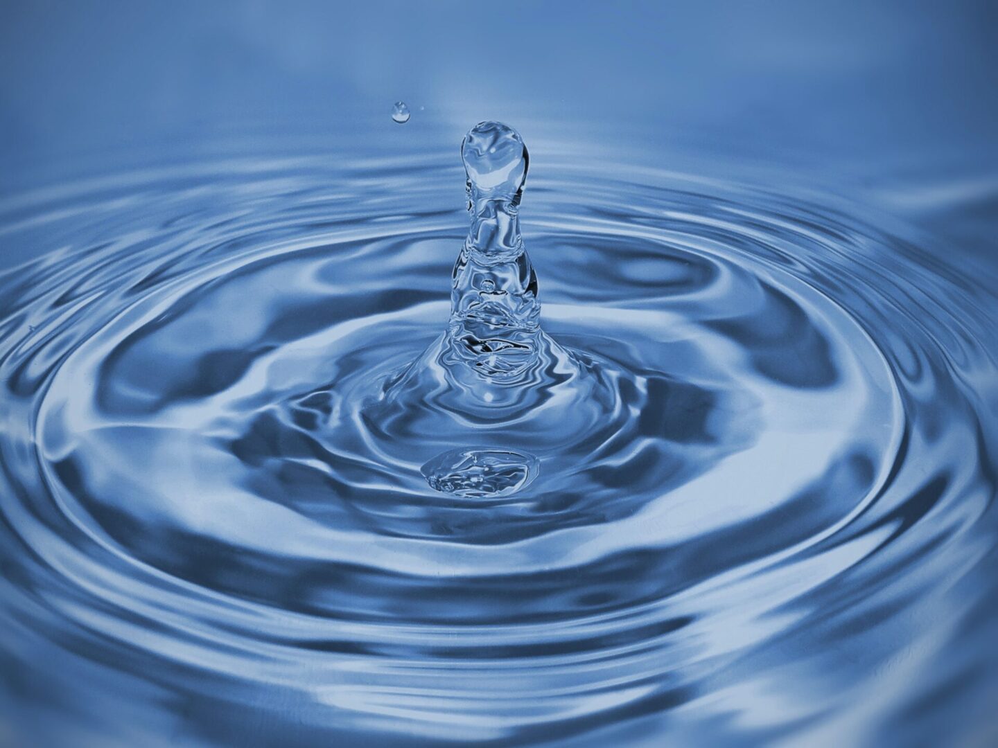 A water drop falling into the ocean.